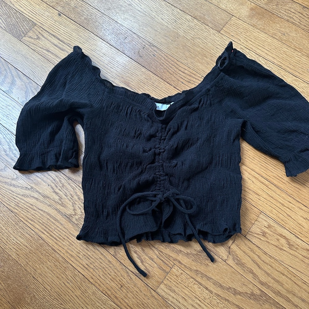 Lush adorable black top with tie in front size small perfect condition